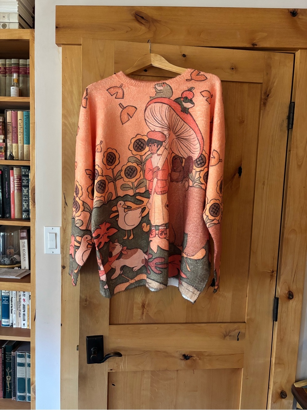 Peach Illustrated Crewneck Sweater with Whimsical Motif